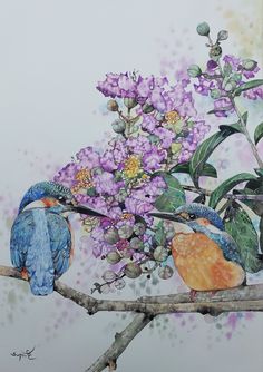 two birds sitting on a branch with purple flowers