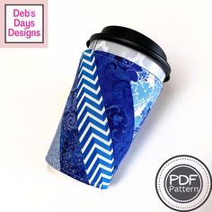 a coffee cup sleeve is shown with the words deb's days designs on it