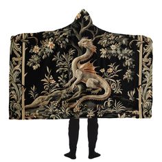 a hooded blanket with a dragon on it