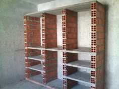 the shelves are made out of red bricks