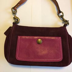 This Has Barely Been Used! It Looks Brand New Even Though It Is Now Vintage! Deep Plum Suede Is The Outside Color With A Pretty Purple/Pink Leather Pouch Pocket. The Inside Is A Beautiful Purple/Pink Silk. There Is A Zipper Pocket On The Inside And A Large Open Pocket. The Hardware Is Aged Looking Gold/Bronze. The Top Handle Has 2 Strips Of Dark Leather Which Shows No Signs Of Wear. This Bag Comes Complete With A Dust Bag And A Suede Brush/Cleaner Also Never Been Used And Provided By Coach. Purple Rectangular Shoulder Bag With Gold-tone Hardware, Rectangular Purple Coach Shoulder Bag, Coach Rectangular Purple Shoulder Bag, Coach Purple Rectangular Shoulder Bag, Purple Shoulder Bag With Gold-tone Hardware For Everyday Use, Purple Clutch Bag With Detachable Strap, Purple Clutch Bag For Daily Use, Purple Clutch With Detachable Strap, Coach Purple Bag With Adjustable Strap