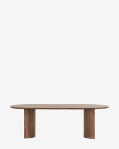 an oval wooden table on a white background