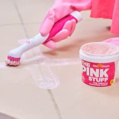 pink stuff is being used to clean the floor