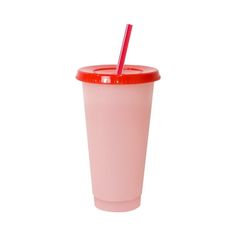 a pink cup with a red lid and a straw in the middle, on a white background