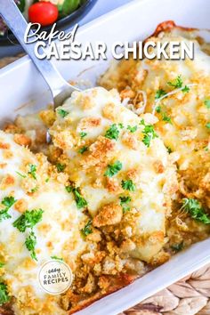 baked casserole with cheese and parmesan in a white dish on a woven place mat