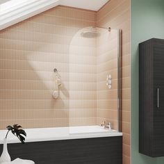 a bath tub sitting under a window next to a sink