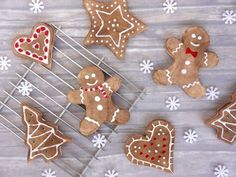 gingerbread cookies on a cooling rack with snowflakes