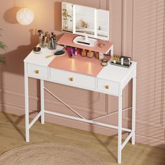 a white desk with makeup and other items on it next to a potted plant