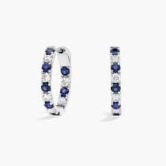 Handcrafted in 14k white gold, these hoop earrings feature gemstones, which alternate with bright diamonds—they’re sure to bring your look full circle. Round Sapphire, Diamond Hoop Earrings, Blue Nile, Full Circle, Precious Gemstones, Gemstone Earrings, Sapphire, Jewelry Earrings, Hoop Earrings