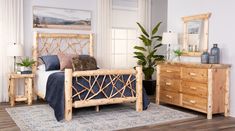 a bed room with a neatly made bed and wooden dresser next to a plant on a rug