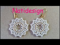 the earrings are made with white seed beads