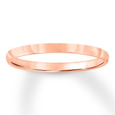 This classic wedding band is crafted of 14K rose gold. The band is 2mm in width. Emerald Engagement Ring White Gold, Eternity Diamond Band, Brown Diamond Ring, White Gold Wedding Band, Blue Crystal Earrings, Jewelry Advice, Rose Gold Morganite, Classic Wedding Band, Unique Diamond Rings