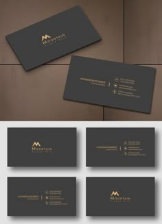 the business card is designed to look like it has gold foil lettering and black paper