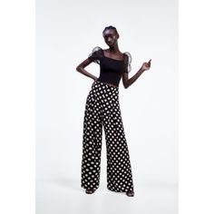 New With Tag. Brand New With Tags Flowy High-Waisted Pants With Front Pleat Detail. Hidden In-Seam Side Zip Closure. - 100% Polyester - Approximate Measurements: 13.5" Waist Across, 16" Rise And 31.5" Inseam 7563/056 Box4 Elegant Fitted Polka Dot Bottoms, Elegant Polka Dot Bottoms For Workwear, Elegant Polka Dot Bottoms For Work, Polka Dot Fitted Party Bottoms, Casual Polka Dot Bottoms For Party, Chic Polka Dot Summer Bottoms, Polka Dot Bottoms For Spring Party, Polka Dot Casual Party Bottoms, Casual Polka Dot Party Bottoms