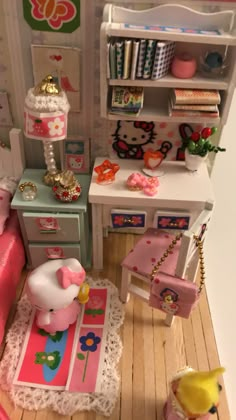 a doll house with furniture and accessories in it