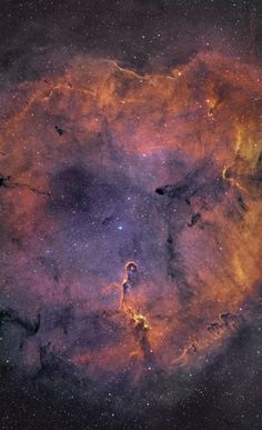 an image of a star formation in the sky with stars all around it and some bright colors