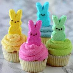 some cupcakes with peeps on them and the words poshmark