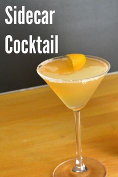 the sidecar cocktail is garnished with an orange slice