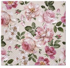 pink roses on white paper napkins with green leaves and flowers in the middle,