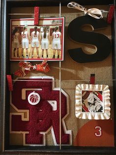 an image of sports related items in a shadow box with ribbons and tags on it