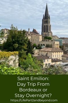 an image of a city with the words saint emile day trip from bordeaux or stay overnight?