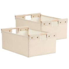 two canvas storage bins with handles, one white and the other light beige color