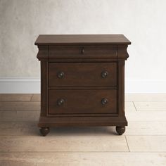 a brown wooden nightstand with two drawers