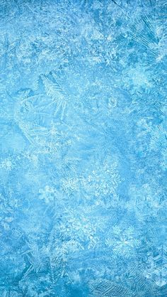 a blue background with snow flakes and the words frozen on it