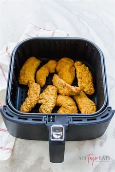 fried chicken in an air fryer basket