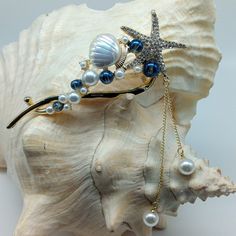 Versatile Hair Clip Beautiful Enough To Be Considered Jewelry Spring Joint For Secure Closure Serrated Projections For Stability And Hold In Desired Placement Jeweled Starfish Iridescent Clam Shell Five Iridescent Blue Beads Ten Mounted Faux Pearls Two Faux Pearls Graduated & Attached By Gold Tone Chain With Movement Medium Weight Pictures Do Not Do This Beauty Justice! Beach Mermaid Coastal Pacific Southwest Nautical Vacation Party Boho Sturdy High Quality Approximately 4 1/2" In Length Elegant Summer Beach Hair Accessories, Sea Inspired Fashion, Ocean Accessories, Weight Pictures, Sea Hair, Ocean Hair, Seashell Crown, Sea Treasure, Beach Mermaid