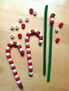 some candy canes and other decorations on a table