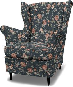 a floral patterned chair with black legs and arms