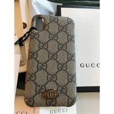 The Ophidia Case For Iphone Presented In The House's Monogram Canvas. First Used In The 1970s, The Gg Logo Was An Evolution Of The Original Gucci Rhombi Design From The 1930s, And From Then It's Been An Established Symbol Of Gucci's Heritage. Beige And Ebony Soft Gg Supreme Canvas Microfiber Lining With Suede-Like Finish Compatible With Iphone Oval Enamel Detail With Metal Double G Fits I-Phone X And Xs Iphone 100, Iphone 7+ Black, Rhombus Design, Iphone 7 Phone Cases, Gucci Mini, Pink Phone Cases, Gg Logo, Iphone Prints, Gucci Leather