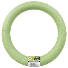 a green foam ring on a white background