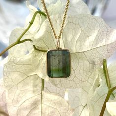 Beautiful Bicolor Tourmaline In Emerald Cut. Tourmaline Measures Approximately 10 X 6 Mm. Pendant With Hoop Measures Approximately 14 X 6 Mm. Doesn't Include Gold Chain. Made In 14k Solid Yellow Gold. Hand Crafted Jewelry, Crafted Jewelry, Solid Yellow, Green Gold, Emerald Cut, Green And Gold, Gold Chain, Handcrafted Jewelry, Gold Chains