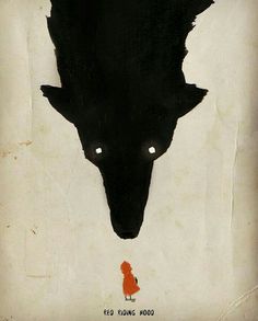 a black wolf with white eyes and an orange fox on it's back side