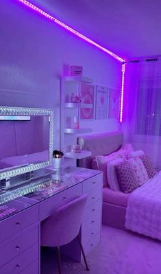 a bedroom with purple lighting in the corner