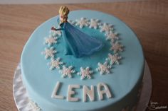 a frozen princess cake with the name lena on it