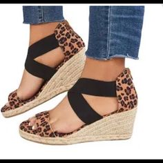 Leopard Print. Black Stretch Bands Cross Over Top Of Foot. Zipper Back. Espadrilles. Wedge. Size 8. Never Worn. New. Cute With Your Fav Jeans. Black Wedge Sandals With Round Toe For Vacation, Casual Espadrille Wedge Slip-on Sandals, Black Casual Wedge Sandals With Round Toe, Casual Black Wedge Sandals With Round Toe, Black Round Toe Wedge Sandals, Black Round Toe Casual Wedge Sandals, Casual Espadrille High Heel Wedge Sandals, Trendy Espadrille Wedge Sandals, Casual Black Wedge Sandals For Spring