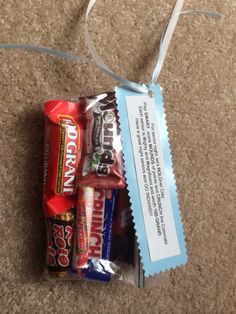 a bag of candy sitting on top of a carpet