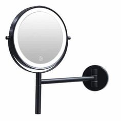 a black wall mounted magnifying mirror on a white background