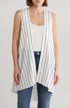 An oversized fit accentuates the asymmetric silhouette of this dramatic vest covered in olished pin stripes to elevate your everyday style. V-neck Front patch pockets 68% rayon, 22% nylon, 10% polyester Machine wash, dry flat Imported Wedge Flip Flops, Pin Stripe, Blazer Vest, Chunky Platform, Platform Wedge, Platform Wedges, Everyday Style, Long A Line, Flip Flop