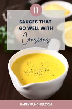 a white bowl filled with soup on top of a wooden table