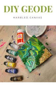 marbled canvass and paint with text overlay that reads diy geode marbled canvass