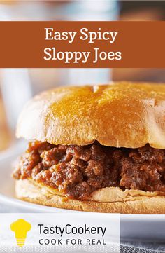 a sloppy joe sandwich on a plate with the title easy spicy sloppy joe's