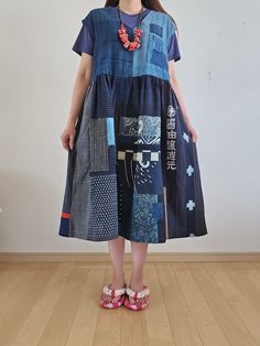 Thank you for viewing. I made a jumper skirt using patchwork of boro rags and stencil-dyed kasuri. Size: Length 115cm, Shoulder width 50cm, Waist circumference 116cm, Hem circumference 216cm 100% cotton, no lining. 2 pockets Shipping: Items are shipped via International e-packet light. (Include Tracking) Delivery will take an AVERAGE of 2~3weeks. Caution: Import duties, taxes, and charges are not included in the item price or shipping cost. These changes are the buyer's responsibility. Please ch Kimono Remake, Patch Dress, Womens Jumpsuits, Jumper Skirt, Pajama Robe, Waist Circumference, Kimono Jacket, Japanese Kimono, 3 Weeks