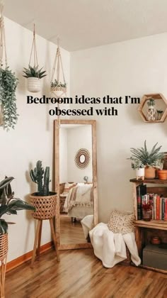 a living room filled with lots of potted plants and hanging planters on the wall