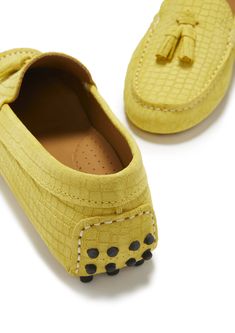 Hugs & Co. yellow tasselled loafer driving shoes for women. Moccasin style driving loafers in luxurious yellow suede upper embossed with a Gecko print pattern and lined with a soft leather for extra comfort. Made in Portugal 100% Suede Upper featuring a 100% Leather Lining Rubber studded sole Yellow Round Toe Loafers With Rubber Sole, Yellow Loafers With Rubber Sole And Round Toe, Yellow Slip-on Moccasins With Rubber Sole, Yellow Leather Slip-on Loafers, Yellow Slip-on Loafers With Rubber Sole, Yellow Suede Slip-on Loafers, Elegant Yellow Leather Loafers, Yellow Leather Flat Loafers, Yellow Leather Loafers With Flat Heel