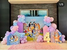 a birthday party with balloons and decorations