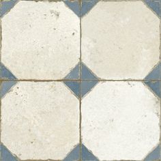 a white and blue checkered tile floor with some black dots on the bottom half